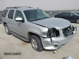 2014 GMC Yukon SLT with VIN 1GKS1CE02ER204452, listed as a IAAI auction lot 41804400 with 176,265 mi miles. Bid and sale history available at carsss.com. Image 1.