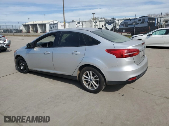 2018 Ford Focus SE with VIN 1FADP3FE3JL261145, listed as a Copart auction lot 47411315 with 98,581 mi miles and Salvage Title. Bid and sale history available at carsss.com. Image 2.