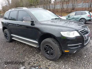 2008 Volkswagen Touareg V6 with VIN WVGBE77L88D020743, listed as a IAAI auction lot 41958009 with 169,548 mi miles and . Bid and sale history available at DreamBid. Image 1.
