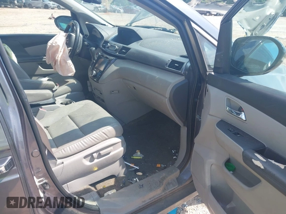 2015 Honda Odyssey Touring Elite with VIN 5FNRL5H95FB127156, listed as a IAAI auction lot 42618059 with 160,074 mi miles and . Bid and sale history available at DreamBid. Image 5.