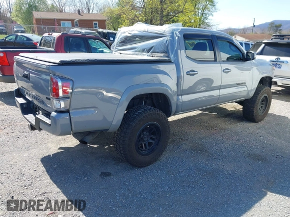 2020 Toyota Tacoma SR5 z VIN 5TFCZ5AN5LX229019, wystawiony jako IAAI lot #41907694 z przebiegiem 79 355 mil mil oraz . Historia ofert i sprzedaży dostępna na DreamBid. Obrazek 4.
