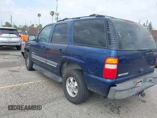 2003 Chevrolet Tahoe LS z VIN 1GNEC13T73R263893, wystawiony jako IAAI lot #41906772 z przebiegiem 211 759 mil mil oraz . Historia ofert i sprzedaży dostępna na DreamBid. Obrazek 3.