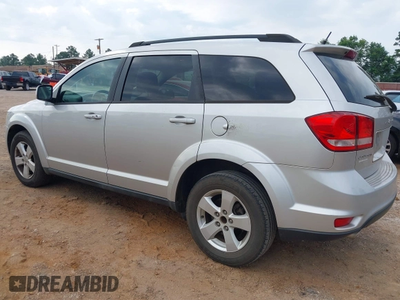 2012 Dodge Journey SXT z VIN 3C4PDCBG4CT189046, wystawiony jako IAAI lot #42410786 z przebiegiem 147 928 mil mil oraz . Historia ofert i sprzedaży dostępna na DreamBid. Obrazek 3.