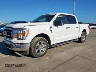 2023 Ford F-150 XL with VIN 1FTEW1CP6PKF11956, listed as a Copart auction lot 56190665 with 61,686 mi miles and Salvage title. Bid and sale history available at DreamBid. Image 1.