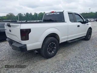 2015 Ford F-150 XL with VIN 1FTEX1C8XFFA75822, listed as a IAAI auction lot 42430498 with 197,181 mi miles and . Bid and sale history available at DreamBid. Image 4.