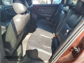 2016 Ford Taurus SHO z VIN 1FAHP2KT6GG140921, wystawiony jako Copart lot #52118935 z przebiegiem 132 199 mil mil oraz Czysty tytuł • Clean title. Historia ofert i sprzedaży dostępna na DreamBid. Obrazek 10.