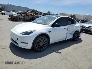 2022 Tesla Model Y Performance z VIN 7SAYGDEF6NF397082, wystawiony jako Copart lot #55823435 z przebiegiem Nie podano mil oraz Szkoda całkowita • Salvage title. Historia ofert i sprzedaży dostępna na DreamBid. Obrazek 1.