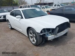 2013 Dodge Charger SXT Plus with VIN 2C3CDXHG8DH614862, listed as a IAAI auction lot 41874630 with 156,213 mi miles. Bid and sale history available at carsss.com. Image 1.