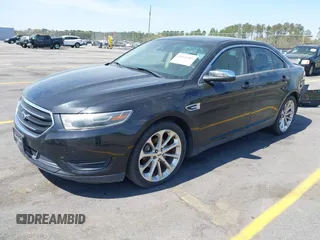 2015 Ford Taurus Limited with VIN 1FAHP2J81FG134973, listed as a IAAI auction lot 41845384 with 139,203 mi miles. Bid and sale history available at carsss.com. Image 19.
