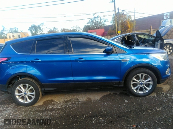 2017 Ford Escape SE with VIN 1FMCU0GD2HUE88197, listed as a IAAI auction lot 40765042 with 87,604 mi miles. Bid and sale history available at carsss.com. Image 13.