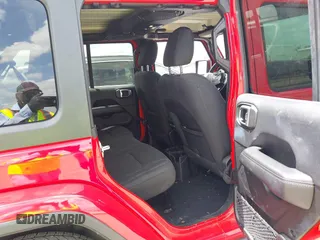 2019 Jeep Wrangler Unlimited Sahara with VIN 1C4HJXEG4KW573157, listed as a IAAI auction lot 42118373 with 105,890 mi miles and . Bid and sale history available at DreamBid. Image 8.