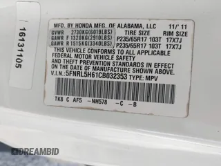 2012 Honda Odyssey EX-L z VIN 5FNRL5H61CB032353, wystawiony jako IAAI lot #42471691 z przebiegiem 186 257 mil mil oraz . Historia ofert i sprzedaży dostępna na DreamBid. Obrazek 9.