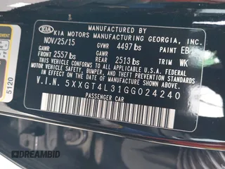 2016 Kia Optima LX with VIN 5XXGT4L31GG024240, listed as a IAAI auction lot 41727309 with 70,031 mi miles. Bid and sale history available at carsss.com. Image 9.