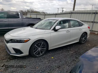 2022 Honda Civic Touring z VIN 2HGFE1F95NH311032, wystawiony jako Copart lot #51078455 z przebiegiem 7 584 mil mil oraz Szkoda całkowita • Salvage title. Historia ofert i sprzedaży dostępna na DreamBid. Obrazek 1.
