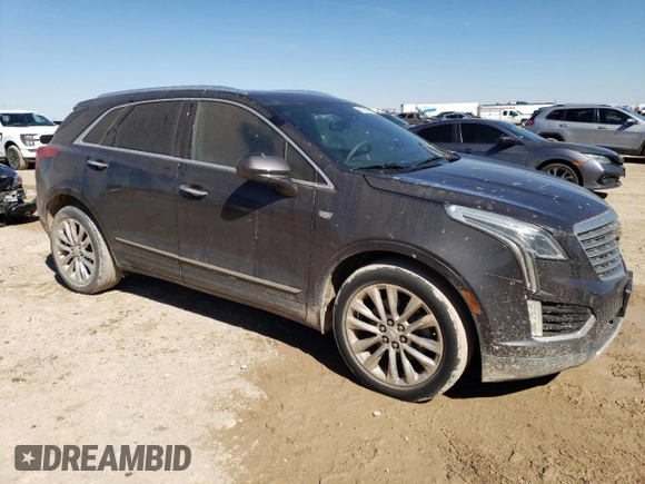 2017 Cadillac XT5 Platinum AWD z VIN 1GYKNFRS6HZ138810, wystawiony jako Copart lot #48029455 z przebiegiem 97 948 mil mil oraz Szkoda całkowita • Salvage title. Historia ofert i sprzedaży dostępna na DreamBid. Obrazek 4.