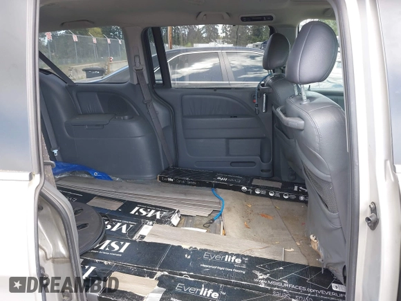 2006 Honda Odyssey TOURING with VIN 5FNRL38806B000049, listed as a IAAI auction lot 42095336 with 218,584 mi miles. Bid and sale history available at carsss.com. Image 8.