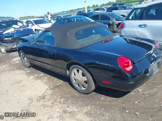 2002 Ford Thunderbird w/Hardtop Premium with VIN 1FAHP60AX2Y116200, listed as a IAAI auction lot 40129557 with 88,991 mi miles. Bid and sale history available at carsss.com. Image 3.
