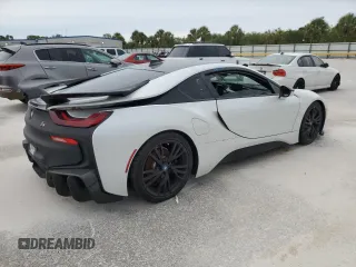 2015 BMW i8 z VIN WBY2Z2C56FV392042, wystawiony jako Copart lot #66972874 z przebiegiem Nie podano mil oraz Szkoda całkowita • Salvage title. Historia ofert i sprzedaży dostępna na DreamBid. Obrazek 3.
