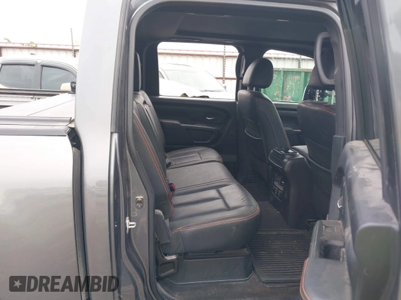2021 Nissan Titan Pro-4X with VIN 1N6AA1ED3MN531332, listed as a IAAI auction lot 41918065 with 125,323 mi miles and . Bid and sale history available at DreamBid. Image 8.