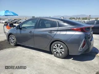 2021 Toyota Prius LE with VIN JTDKAMFPXM3174423, listed as a Copart auction lot 57614925 with Not provided miles and Non repairable. Bid and sale history available at DreamBid. Image 2.