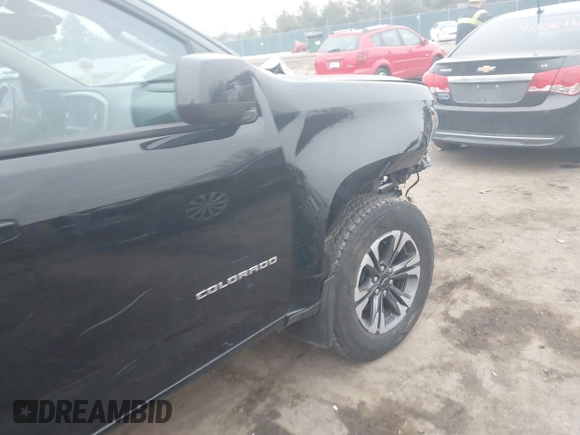 2022 Chevrolet Colorado 4WD Z71 with VIN 1GCGTDEN4N1329447, listed as a IAAI auction lot 41564443 with 27,730 mi miles and . Bid and sale history available at DreamBid. Image 6.