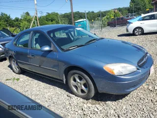 2001 Ford Taurus SE with VIN 1FAFP53U61A161763, listed as a Copart auction lot 43317165 with 64,025 mi miles and Salvage title. Bid and sale history available at DreamBid. Image 4.