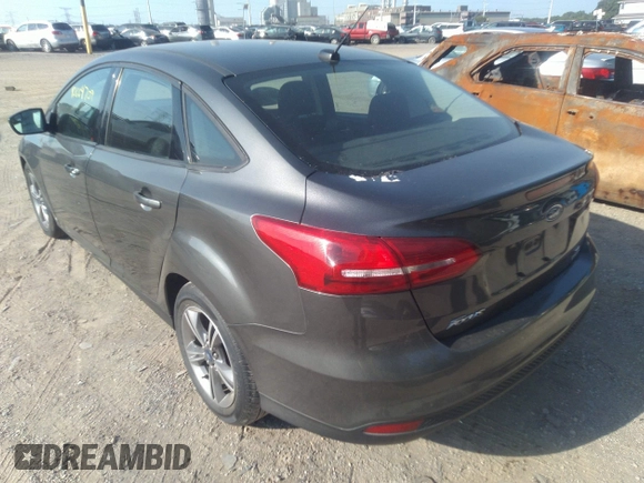 2017 Ford Focus SE with VIN 1FADP3FE3HL295192, listed as a IAAI auction lot 42664709 with 47,589 mi miles and . Bid and sale history available at DreamBid. Image 3.