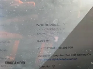 2024 Tesla Model Y Long Range with VIN 7SAYGAEE7RF205700, listed as a Copart auction lot 53814155 with 8,986 mi miles and Salvage Title. Bid and sale history available at DreamBid. Image 9.