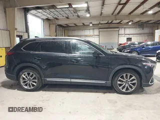 2016 Mazda CX-9 Signature z VIN JM3TCBEY5G0111286, wystawiony jako IAAI lot #42018161 z przebiegiem 155 920 mil mil oraz . Historia ofert i sprzedaży dostępna na DreamBid. Obrazek 13.