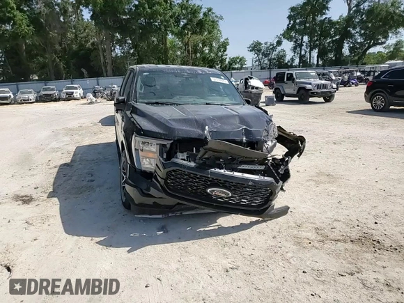 2023 Ford F-150 XL z VIN 1FTEW1CP6PKD30131, wystawiony jako Copart lot #57114985 z przebiegiem 18 525 mil mil oraz Nie do naprawy • Non repairable. Historia ofert i sprzedaży dostępna na DreamBid. Obrazek 13.