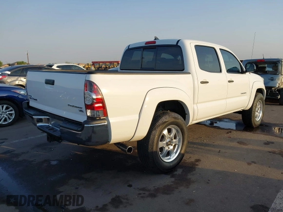 2014 Toyota Tacoma PreRunner with VIN 3TMJU4GN3EM160587, listed as a IAAI auction lot 42710985 with 200,867 mi miles and . Bid and sale history available at DreamBid. Image 4.