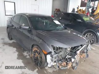 2020 Honda Civic Si with VIN 2HGFC1E54LH701010, listed as a IAAI auction lot 41330601 with 134,814 mi miles and . Bid and sale history available at DreamBid. Image 1.