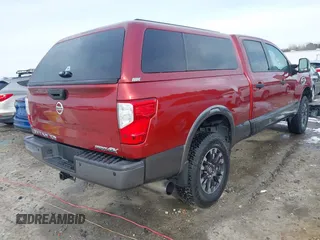 2016 Nissan Titan XD PRO-4X with VIN 1N6BA1F47GN515917, listed as a IAAI auction lot 41355875 with 95,793 mi miles. Bid and sale history available at carsss.com. Image 4.
