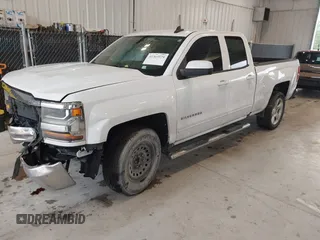 2018 Chevrolet Silverado 1500 LT with VIN 1GCRCREC0JZ204834, listed as a IAAI auction lot 41363579 with 135,247 mi miles and . Bid and sale history available at DreamBid. Image 2.