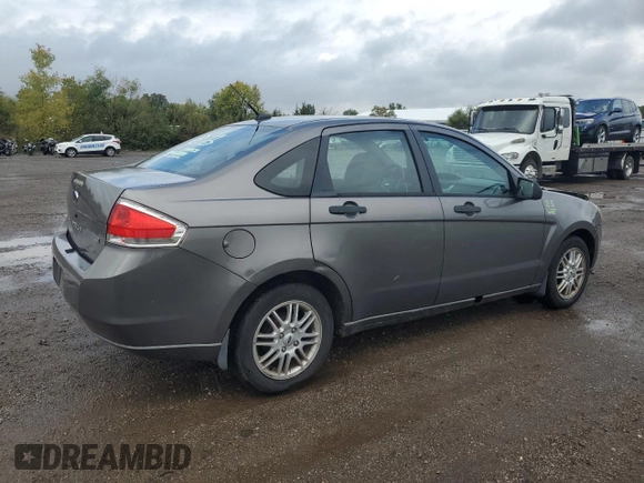 2009 Ford Focus SE with VIN 1FAHP35N39W258484, listed as a Copart auction lot 72679704 with 88,824 mi miles and Salvage Title. Bid and sale history available at DreamBid. Image 3.