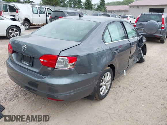 2014 Volkswagen Jetta SE with VIN 3VWD07AJ2EM209176, listed as a IAAI auction lot 42460383 with 172,550 mi miles and . Bid and sale history available at DreamBid. Image 4.