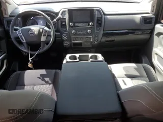 2024 Nissan Titan SV with VIN 1N6AA1EC2RN101063, listed as a Copart auction lot 49879235 with 12,418 mi miles and Salvage title. Bid and sale history available at DreamBid. Image 8.