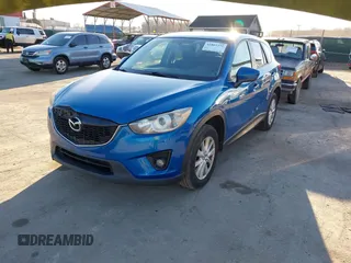 2013 Mazda CX-5 Touring z VIN JM3KE4CE7D0119119, wystawiony jako IAAI lot #41802331 z przebiegiem 204 417 mil mil oraz . Historia ofert i sprzedaży dostępna na DreamBid. Obrazek 2.