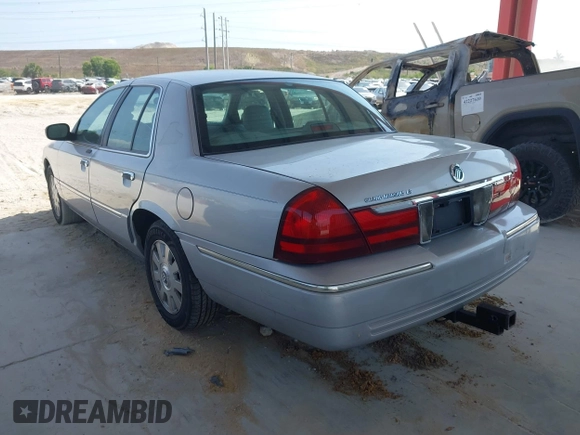 2003 Mercury Grand Marquis LS Premium z VIN 2MEFM75W83X631023, wystawiony jako IAAI lot #42227245 z przebiegiem 114 235 mil mil oraz . Historia ofert i sprzedaży dostępna na DreamBid. Obrazek 3.