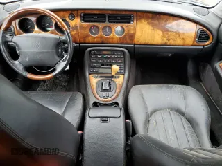 2002 Jaguar XK with VIN SAJDA42C12NA23956, listed as a Copart auction lot 45432365 with 84,827 mi miles and Clean Title. Bid and sale history available at DreamBid. Image 8.
