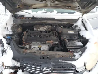 2007 Hyundai Accent GL z VIN KMHCN45CX7U127037, wystawiony jako Copart lot #86041984 z przebiegiem 212 828 mil mil oraz Szkoda całkowita • Salvage title. Historia ofert i sprzedaży dostępna na DreamBid. Obrazek 11.