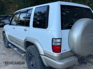 2001 Isuzu Trooper S z VIN JACDJ58X417J03071, wystawiony jako Copart lot #77033444 z przebiegiem 151 982 mil mil oraz Szkody całkowita. Historia ofert i sprzedaży dostępna na DreamBid. Obrazek 3.
