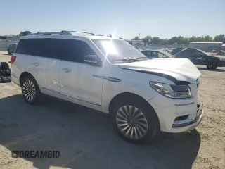 2019 Lincoln Navigator Reserve with VIN 5LMJJ2LT1KEL19974, listed as a Copart auction lot 62643925 with 64,030 mi miles and Salvage title. Bid and sale history available at DreamBid. Image 4.