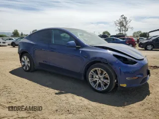 2021 Tesla Model Y Long Range with VIN 5YJYGDEE7MF114420, listed as a Copart auction lot 53889365 with 74,363 mi miles and Salvage Title. Bid and sale history available at DreamBid. Image 4.