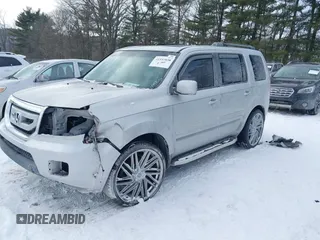 2011 Honda Pilot EX-L with VIN 5FNYF3H6XBB041672, listed as a IAAI auction lot 41337038 with 205,741 mi miles and . Bid and sale history available at DreamBid. Image 20.