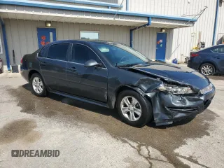 2015 Chevrolet Impala LS with VIN 2G1WA5E38F1165968, listed as a Copart auction lot 61467355 with 143,848 mi miles and Salvage title. Bid and sale history available at DreamBid. Image 4.