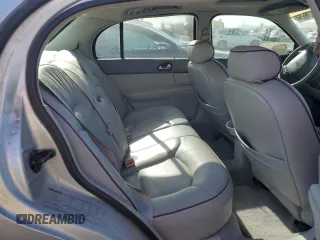 1996 Lincoln Continental z VIN 1LNLM97V3TY627803, wystawiony jako Copart lot #87036654 z przebiegiem 118 078 mil mil oraz Szkoda całkowita • Salvage title. Historia ofert i sprzedaży dostępna na DreamBid. Obrazek 10.