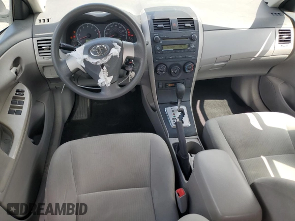 2010 Toyota Corolla with VIN 2T1BU4EE7AC350676, listed as a Copart auction lot 54970525 with 91,027 mi miles and Salvage title. Bid and sale history available at DreamBid. Image 8.
