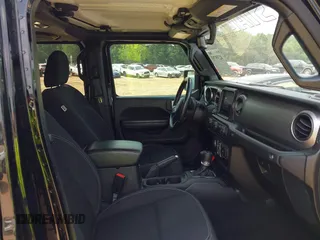 2021 Jeep Gladiator Willys with VIN 1C6HJTAG7ML514114, listed as a IAAI auction lot 42399793 with 78,829 mi miles and . Bid and sale history available at DreamBid. Image 5.