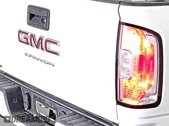 2021 GMC Canyon 2WD Elevation z VIN 1GTG5CEN5M1140499, wystawiony jako IAAI lot #42556124 z przebiegiem 41 450 mil mil oraz . Historia ofert i sprzedaży dostępna na DreamBid. Obrazek 10.